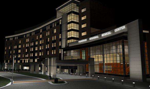 A modern multi-story hospital building, Parkview Regional Medical Center, is illuminated at night with lights shining from the windows and entrance—enhanced by advanced Illuminating Engineering Software.