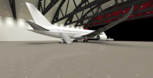 A large white commercial airplane is parked inside a spacious, well-lit hangar—thanks to the expertise of Lighting Analysts—with service vehicles nearby.