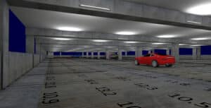 A spacious indoor parking garage with numbered parking spaces, featuring a red car in the foreground and two other cars parked in the distance.